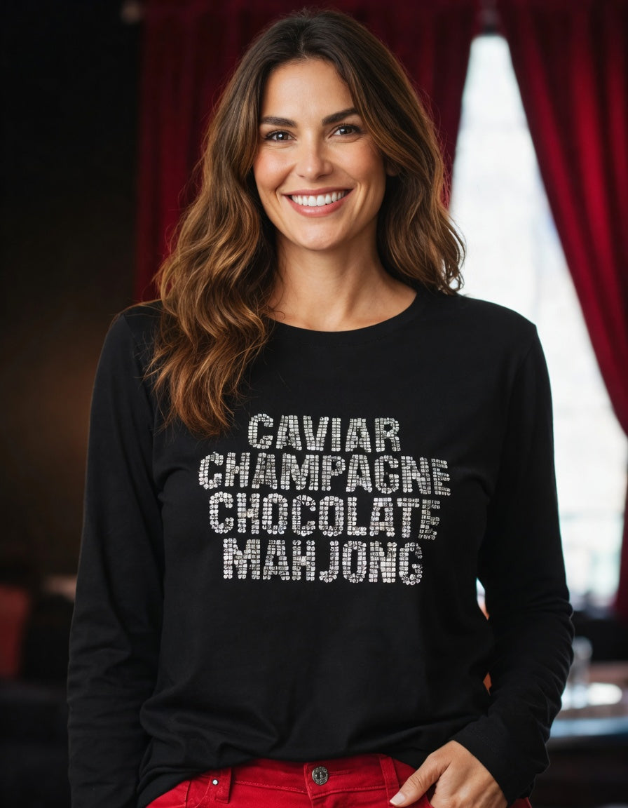 Woman wearing design Caviar Mahjong in black long sleeve, design in rhinestone crystals