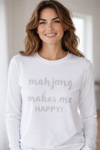 Woman wearing a white long-sleeve shirt with 'mahjong makes me HAPPY!' text.